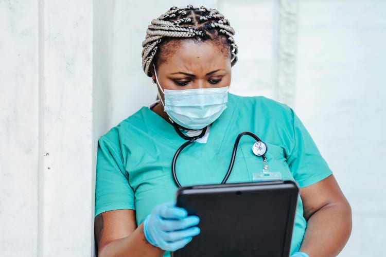 Nurse using an EMR