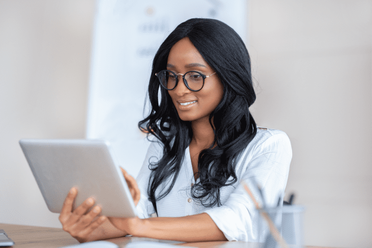 Female Nurse Reading Tablet