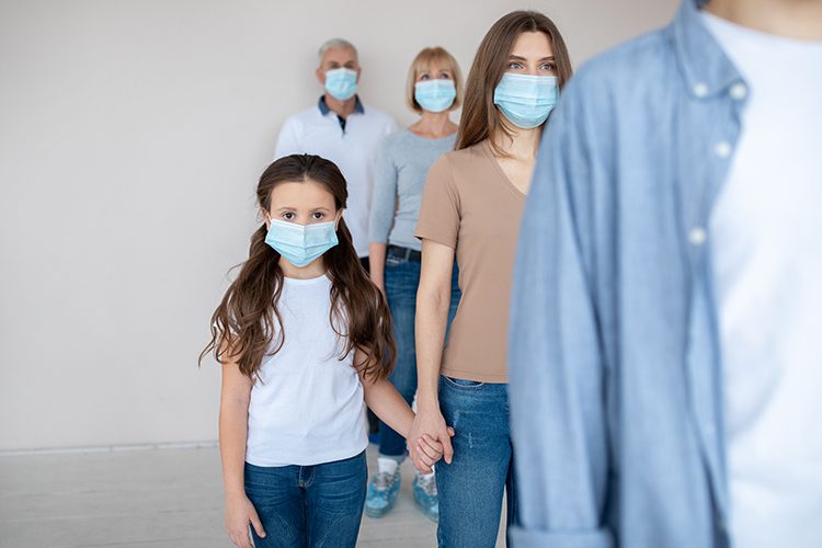 Parent and Child in Medical Masks - Featured Image