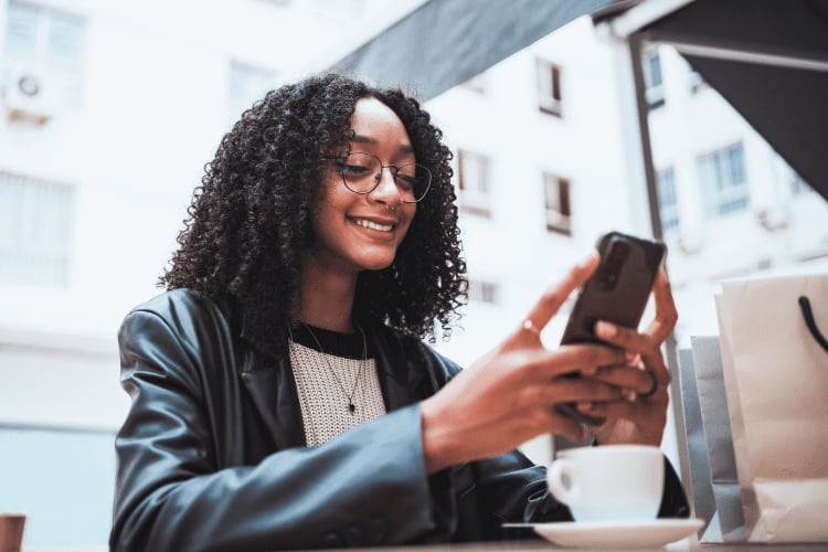 Generation Z women on mobile device