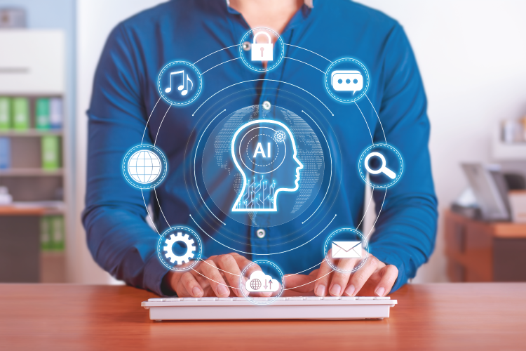 Person using a laptop with virtual icons representing artificial intelligence and related technologies, such as email, security, music, and search, displayed above the keyboard.