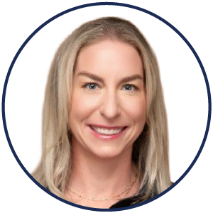Smiling woman with long blonde hair, light skin, and blue eyes, pictured against a plain white background within a circular frame, embodying the warmth and reassurance of an enhanced ambient AI patient experience.